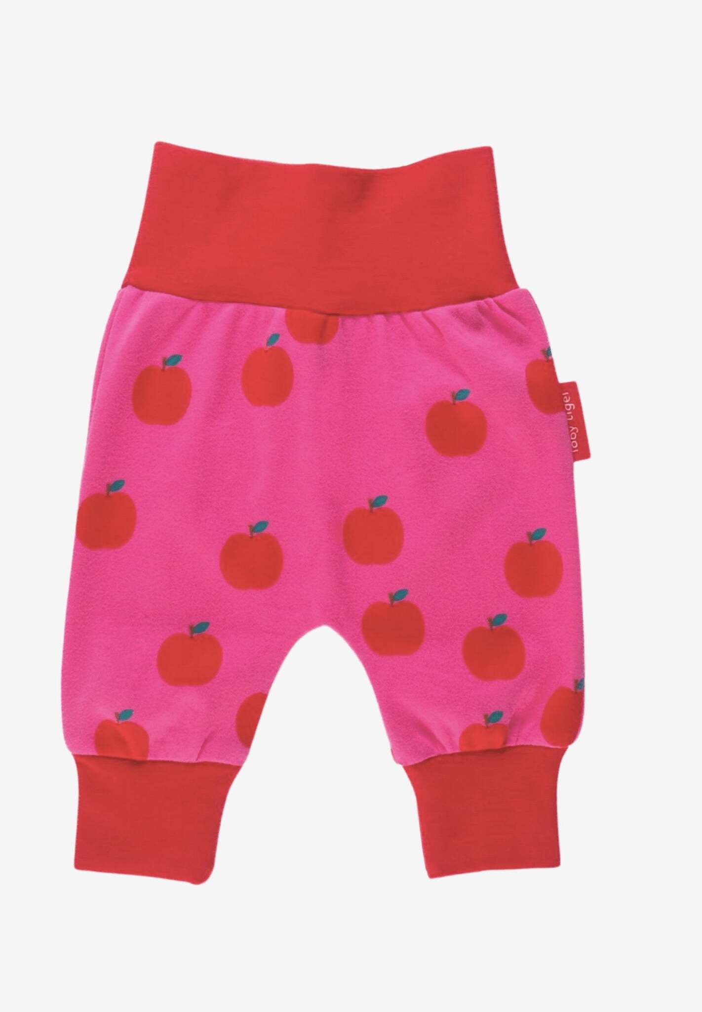 Premium organic cotton kids yoga pants with red apple print, stylish contrast pink waist and ankle cuffs, soft GOTS certified fabric by Toby Tiger at brixbailey.com