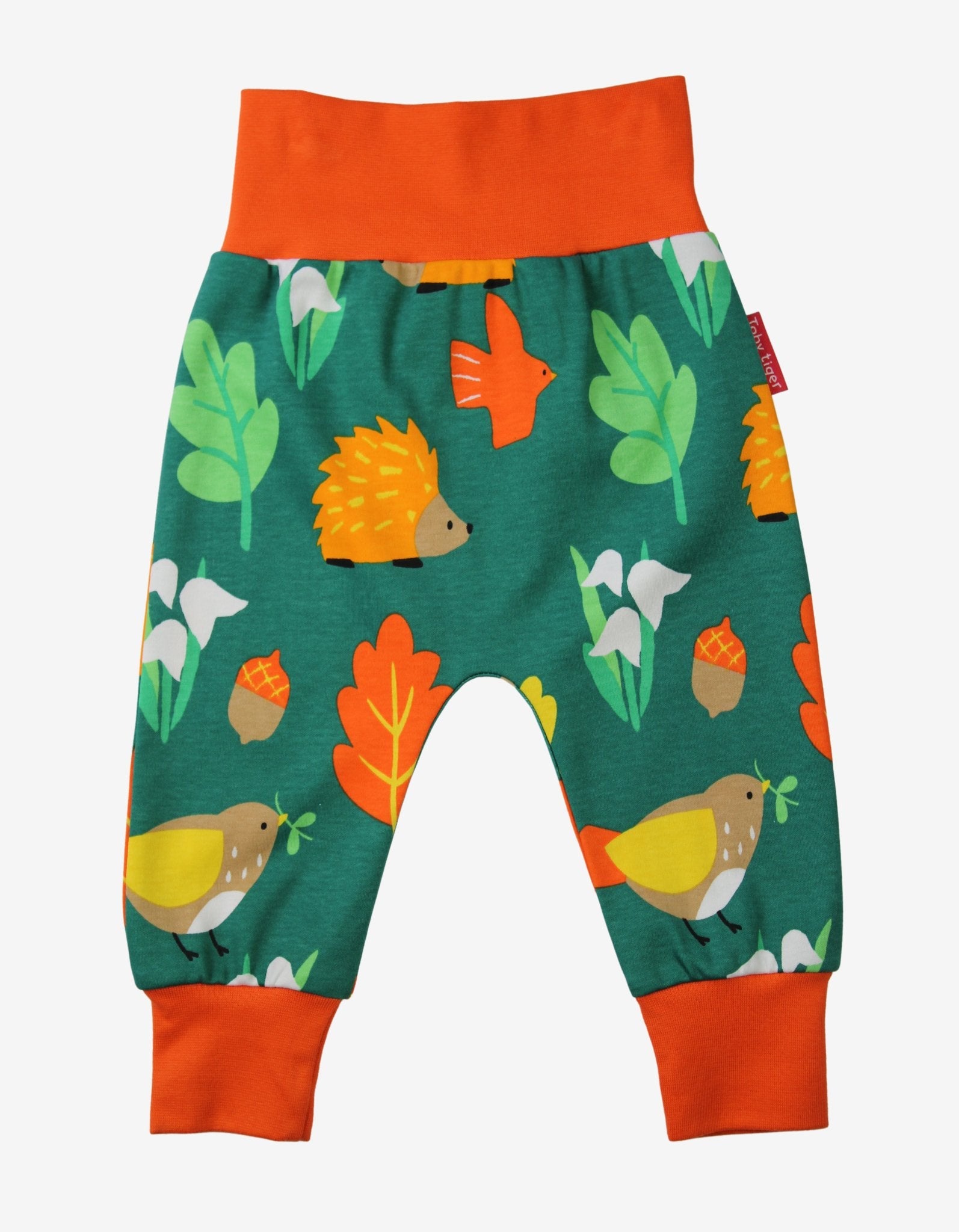 Bright colorful organic kids yoga pants with orange yellow hedgehog bird leaf snowdrop print, premium soft GOTS certified cotton by Toby Tiger at brixbailey.com