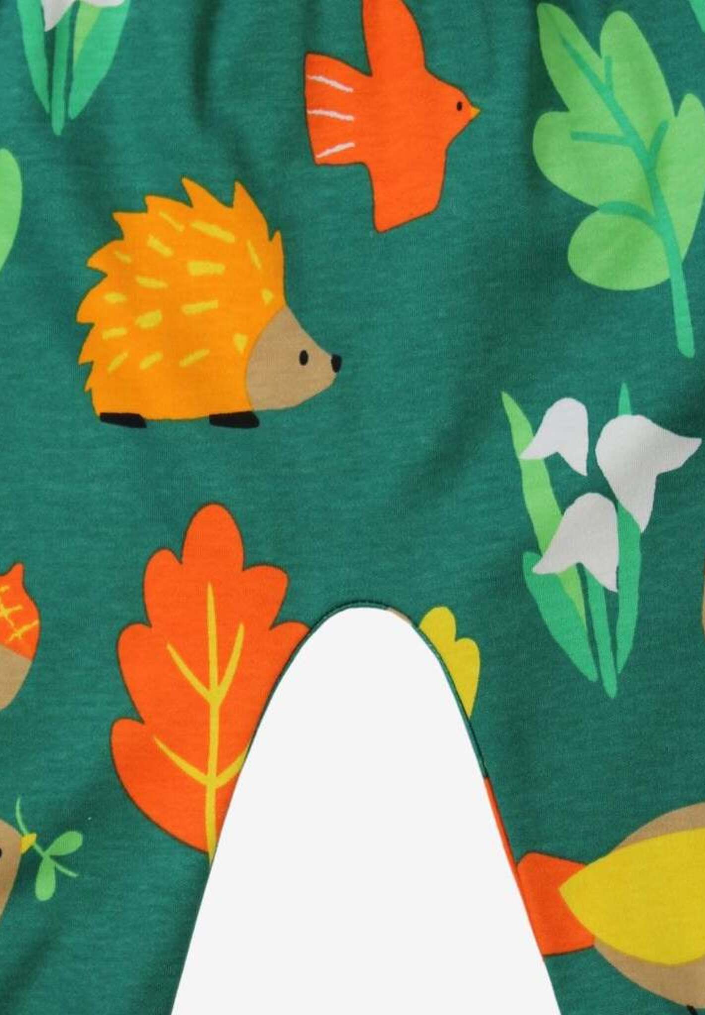 Bright colorful organic kids yoga pants with orange yellow hedgehog bird leaf snowdrop print, premium handcrafted GOTS certified cotton by Toby Tiger at brixbailey.com