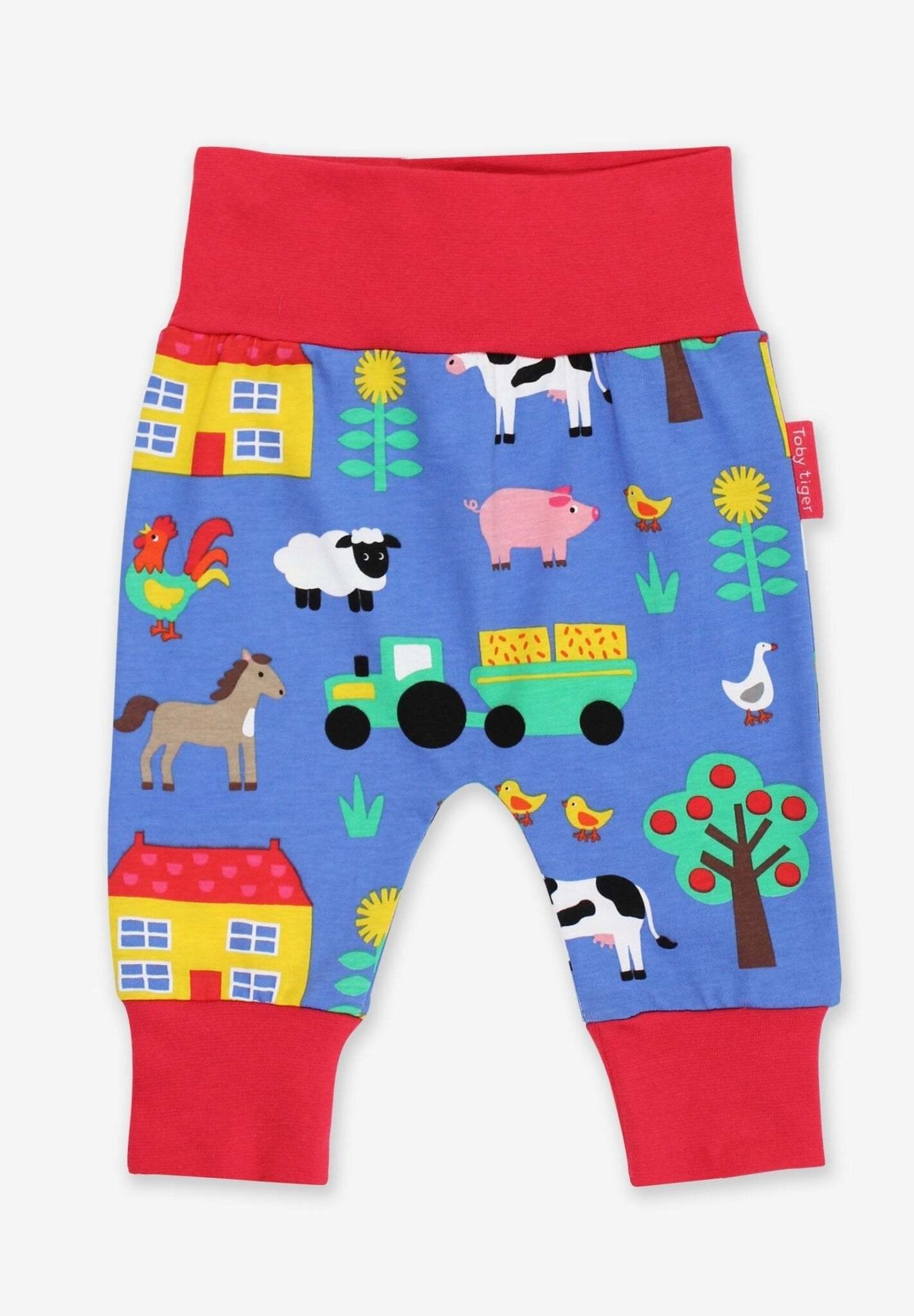 Comfortable Baby Yoga Pants with Farm Animal Print in Soft Organic Cotton for Crawling and Walking by Toby Tiger at brixbailey.com