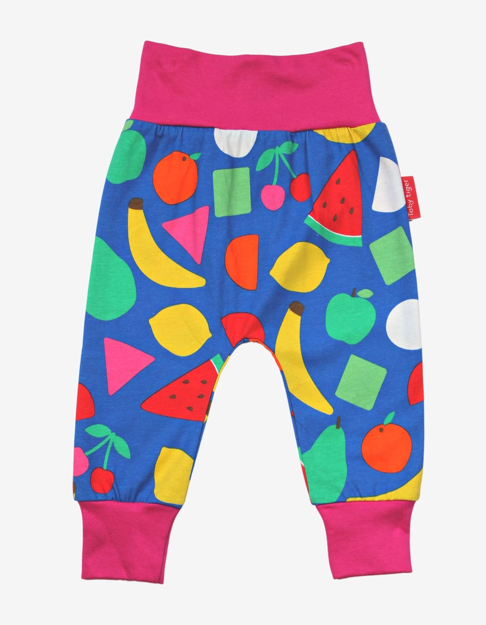 Premium kids yoga pants with vibrant fruit print, stylish elastic waistband, 100% organic cotton, comfortable and breathable by Toby Tiger at brixbailey.com