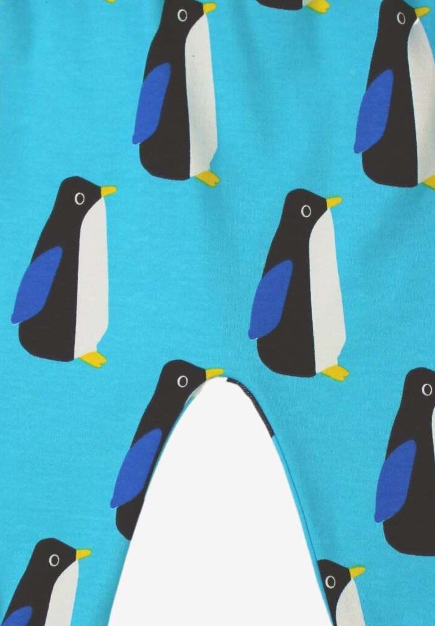 Premium baby blue organic cotton yoga pants with penguin print, elastic waistband, ankle cuffs, soft GOTS-certified fabric by Toby Tiger at brixbailey.com