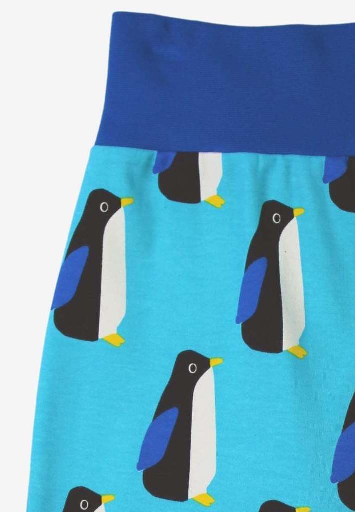 Premium organic cotton yoga pants for toddlers, soft blue with cute penguin print, elastic waistband and cuffs, GOTS certified, machine washable by Toby Tiger at brixbailey.com