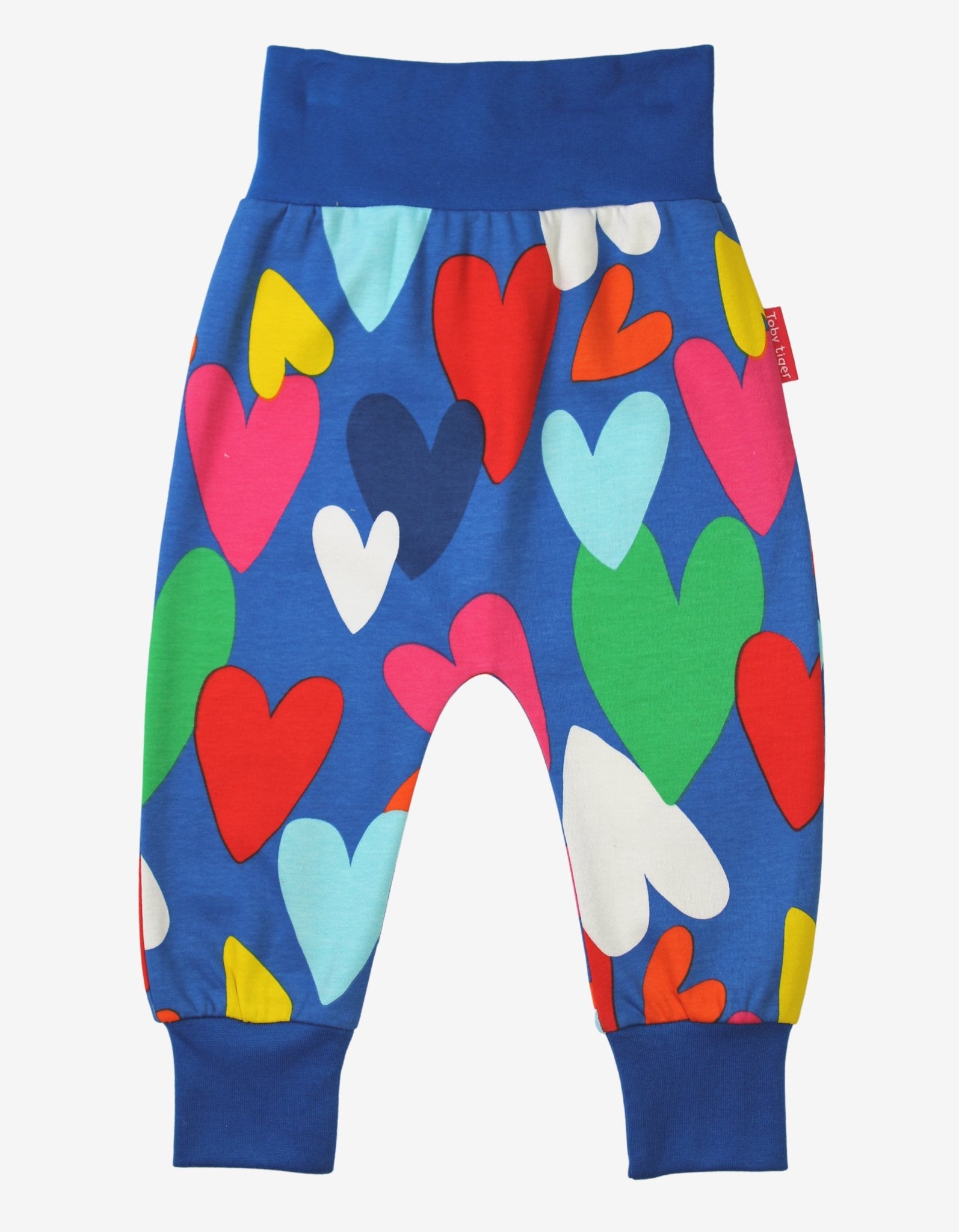 Fun and Colorful Heart-Print Yoga Pants for Kids, Soft Organic Cotton with Comfortable Waist and Ankle Cuffs by Toby Tiger at brixbailey.com