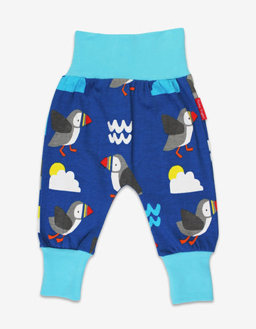 Stylish Organic Yoga Pants with Happy Parrot Print Featuring Sun, Clouds, and Waves for a Cool Look by Toby Tiger at brixbailey.com