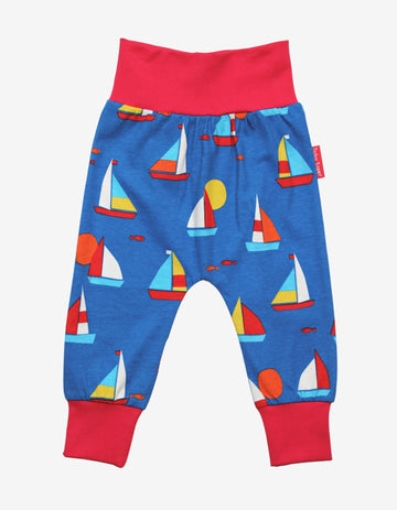 Premium organic cotton kids yoga pants with sailboat print, stylish red waistband, comfortable ankle cuffs, GOTS certified, trendy and breathable by Toby Tiger at brixbailey.com