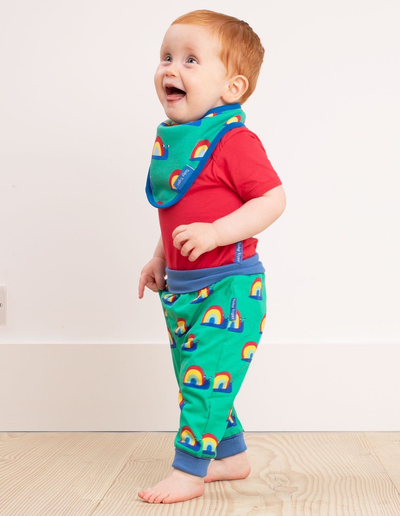 Premium baby pants with snail print, soft GOTS certified organic cotton, flexible waistband, stylish and comfortable by Toby Tiger at brixbailey.com