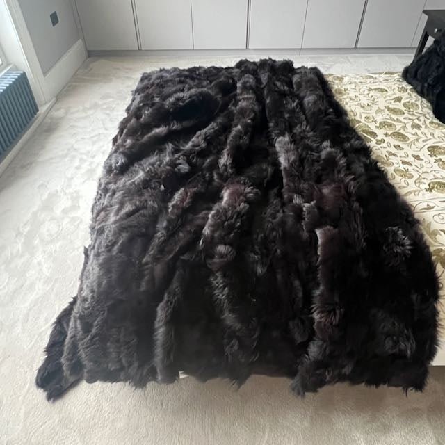 Luxury dark chocolate Tuscan shearling throw, premium fur blanket, best-selling sheepskin rug, stylish sustainable home accent by Wildash London at brixbailey.com