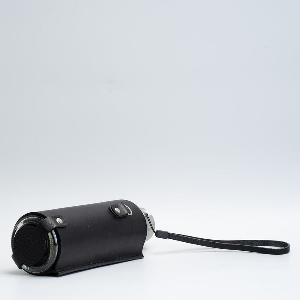 Leather water bottle holder with strap and glass bottle | OUTLET