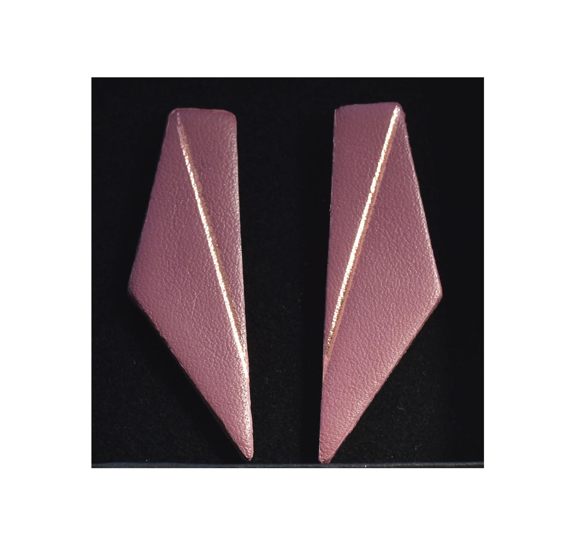 Handmade Short Wing Earrings – Luxurious Spanish Leather Artistry by Gerda Retter Design at www.brixbailey.com
