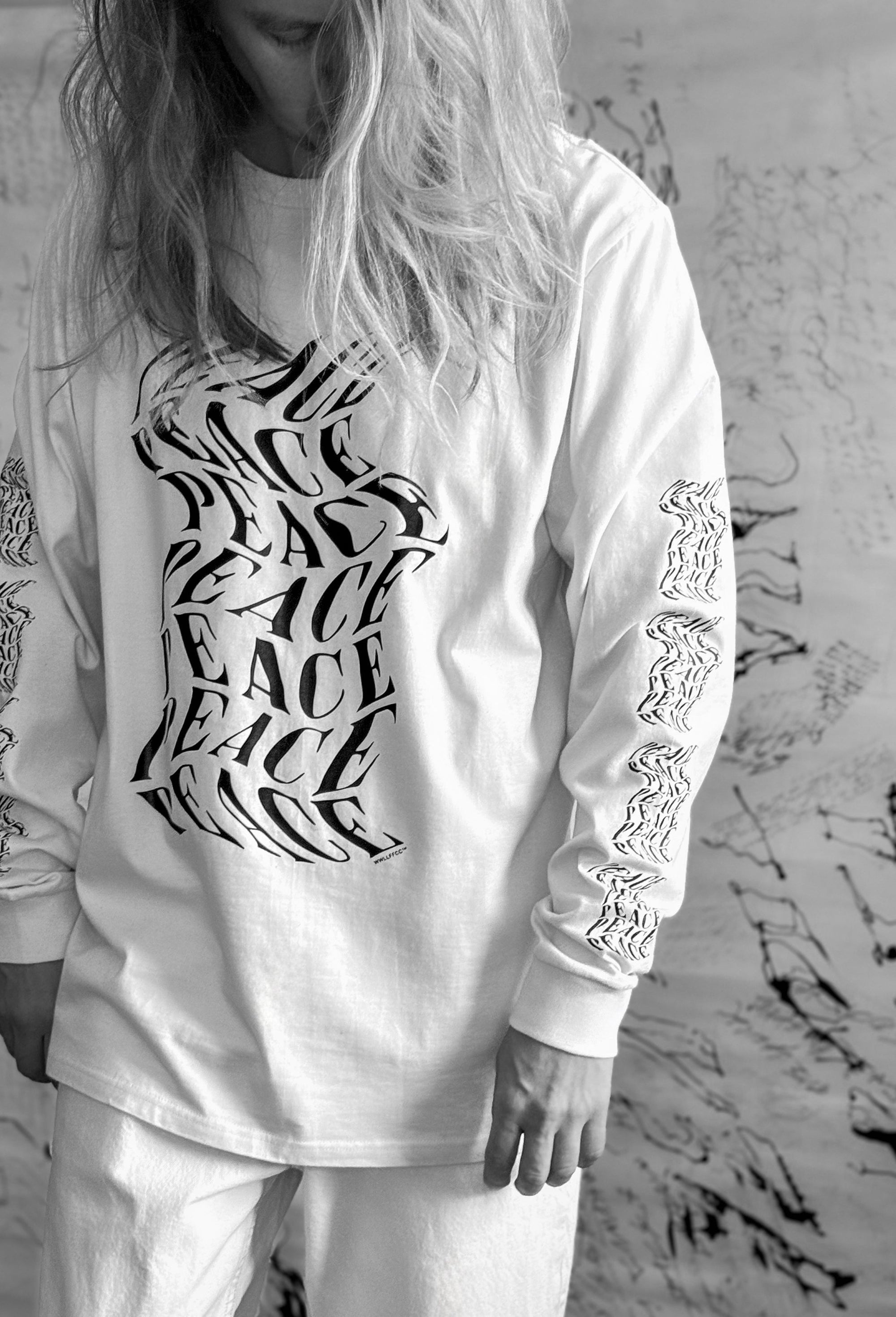 Luxury oversized off-white long sleeve with matte black graphics, premium 200 gsm organic cotton fabric, handcrafted limited edition by WWOOLLFF CO. at brixbailey.com