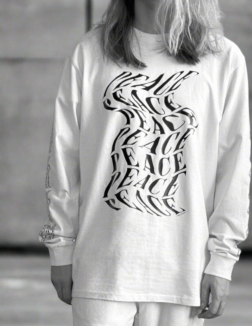 Luxury oversized off-white long sleeve with matte black graphics, premium 200 gsm organic cotton, handcrafted limited edition by WWOOLLFF CO. at brixbailey.com