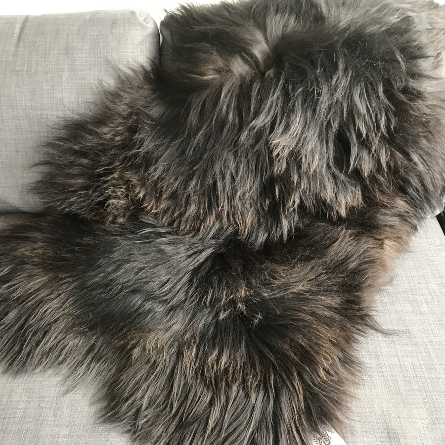 Luxury XL Icelandic natural black brown espresso sheepskin rug, premium eco-friendly 100% wool, soft long fur, best-selling home decor by Wildash London at brixbailey.com