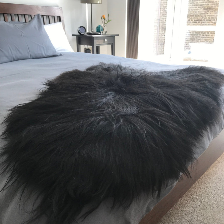 Luxury Icelandic natural black undyed sheepskin hide, sustainably sourced, premium eco-tanned, soft and elegant home decor by Wildash London at brixbailey.com