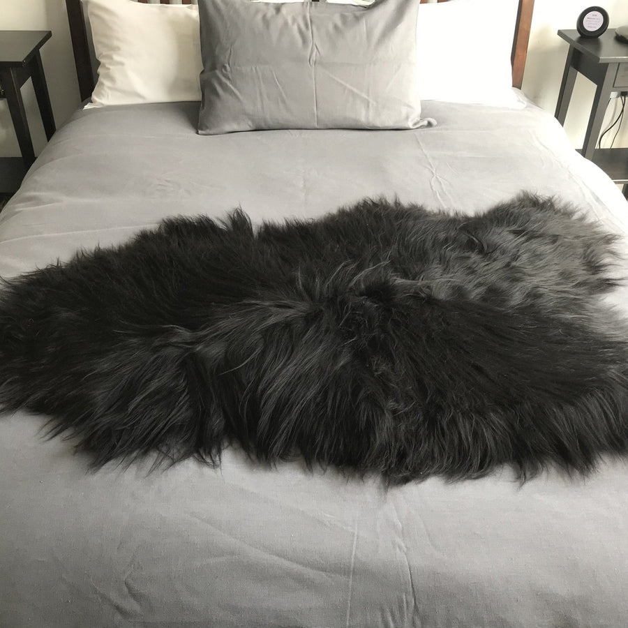 Luxury Icelandic natural black undyed sheepskin hide, premium eco-tanned, sustainably sourced, soft and elegant home decor by Wildash London at brixbailey.com