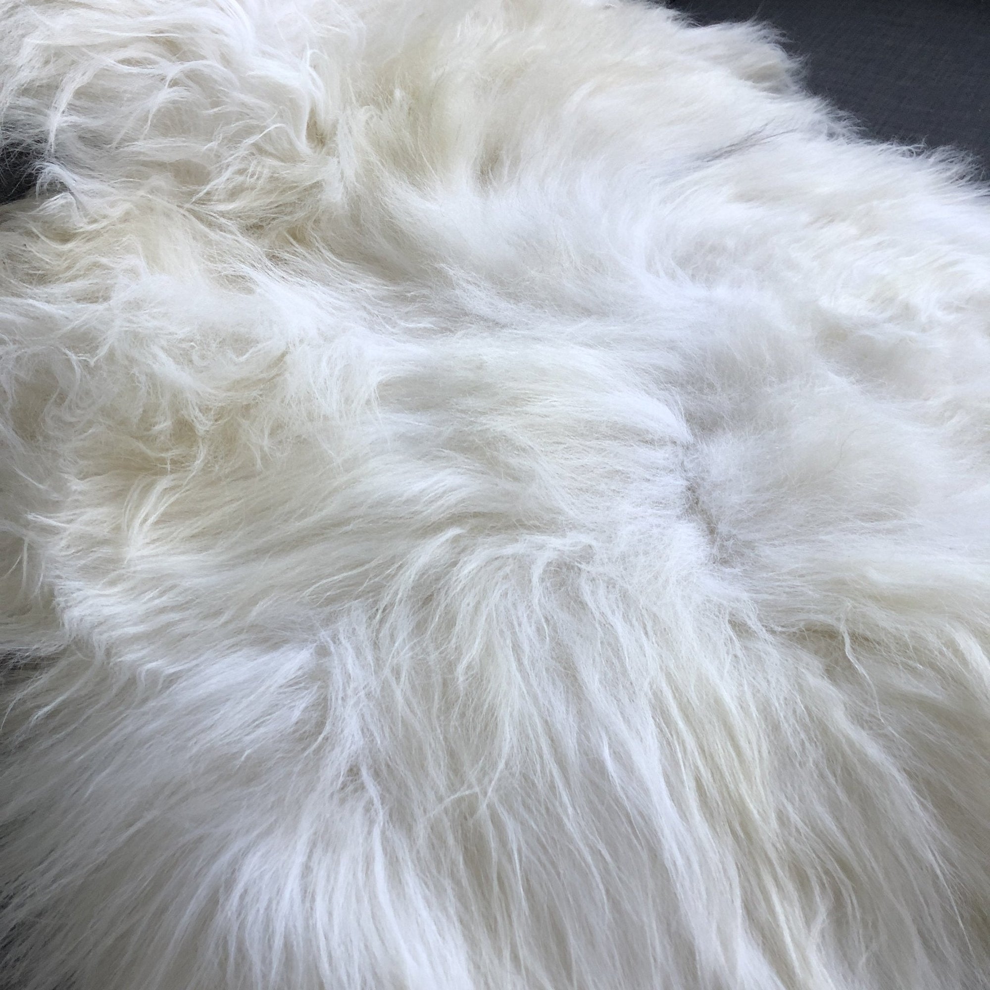 Luxury Icelandic white long fur sheepskin rug, premium natural undyed sheepskin throw, handcrafted large fleece for living room or bedroom by Wildash London at brixbailey.com