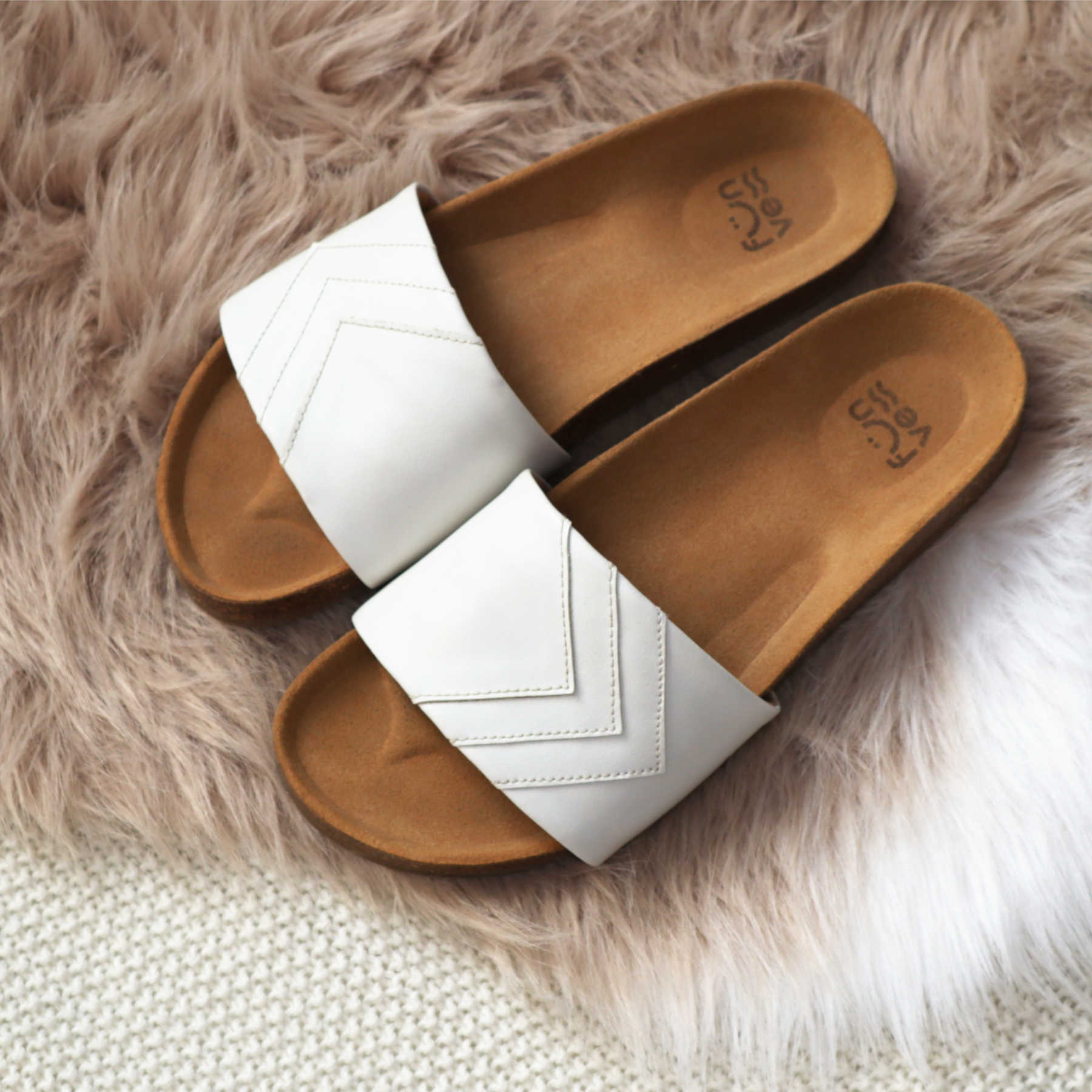 Premium white vegan sandals YANG, monochrome, comfortable straps, soft footbed, slip-resistant sole, sustainable fair fashion by Fünve at brixbailey.com